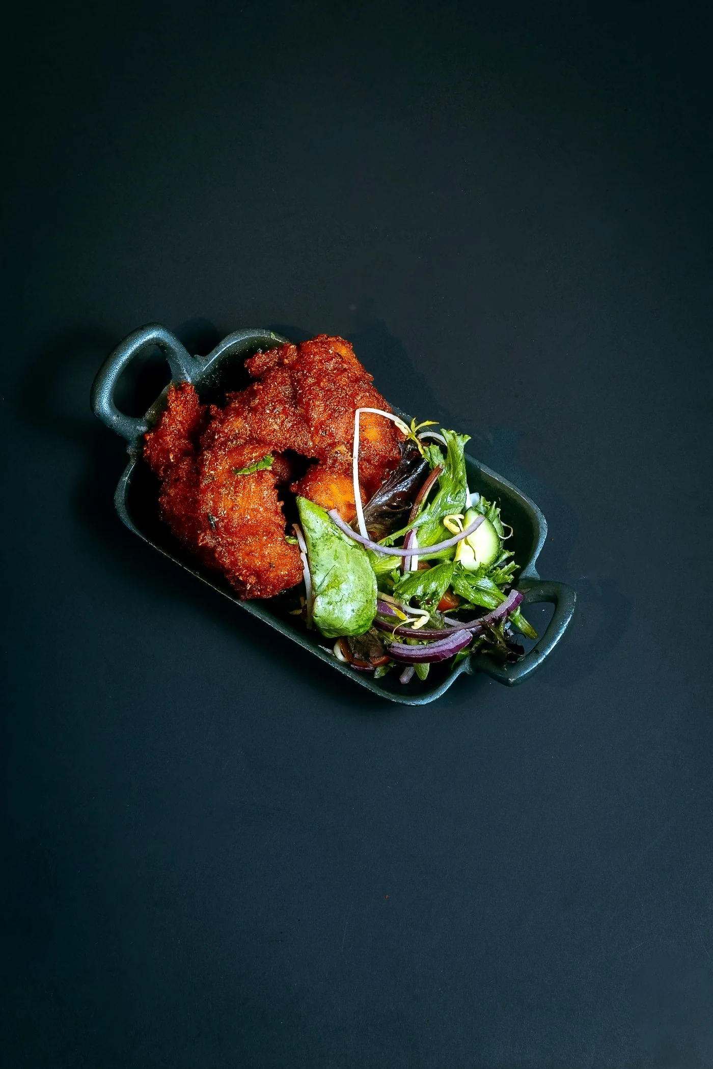 Crispy vegetable pakora — see more on our Instagram